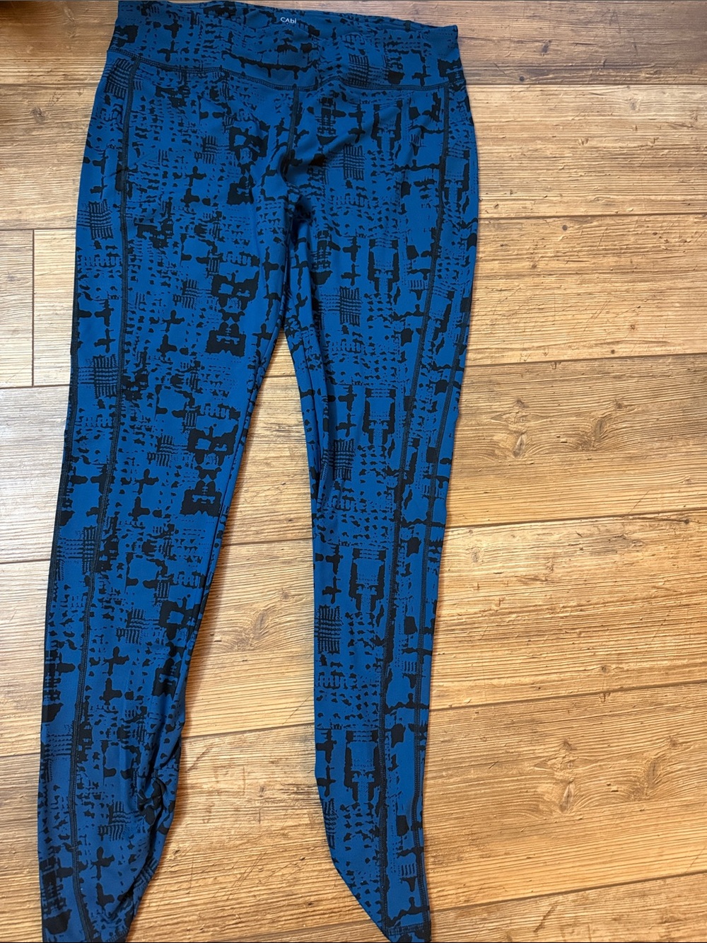 CAbi Blue Leggings with Black Graphic Print women’s Large. EUC